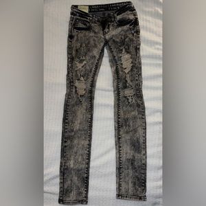 Black and gray distressed jeans by Machine